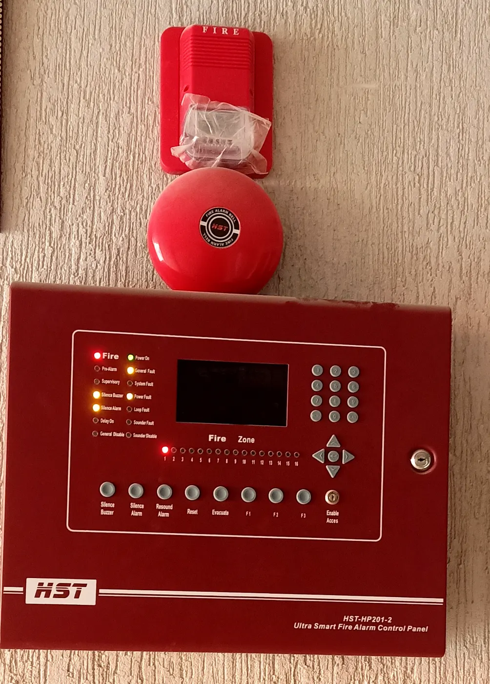 Fire alarm control panel with bell, strobe and call point